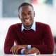 Businessman, laughing and creative in office portrait, smile and designer career with African or black man. Leadership, company mission and startup development or entrepreneur, professional or growth.